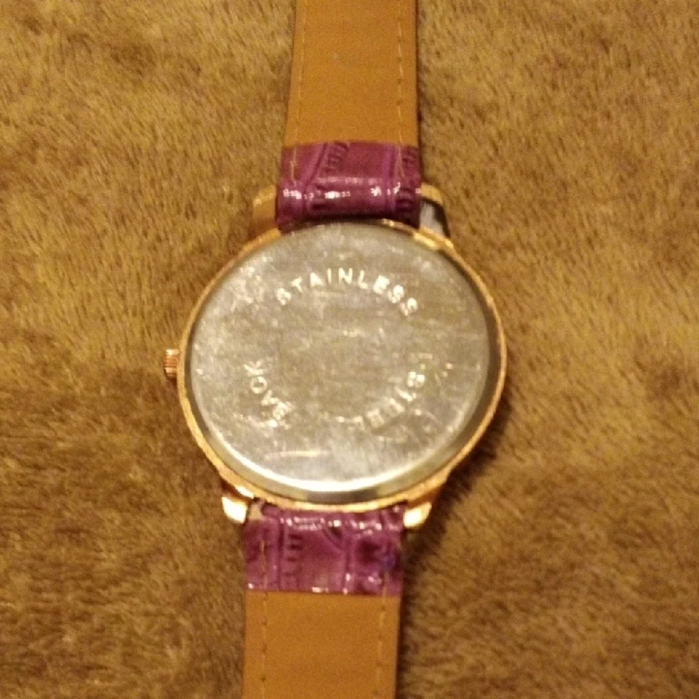 Elegant Women's Watch with Purple Strap and Gold Detailing